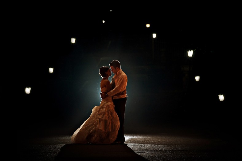 night time portrait of bride and groom