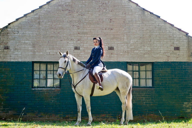 Girl on white horse