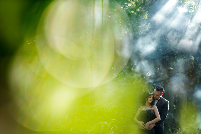 Couple with tux and black wedding dress