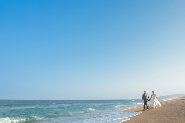Bride and groom on zimbali Beach