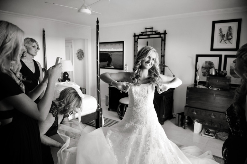 Bride getting into dress Wedding at the Oyster Box Hotel Durban South Africa