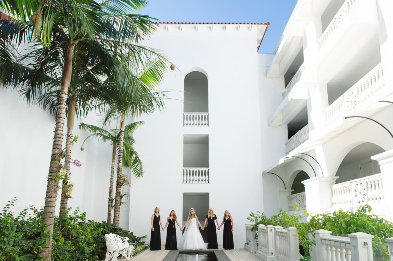 Bride getting into dress Wedding at the Oyster Box Hotel Durban South Africa