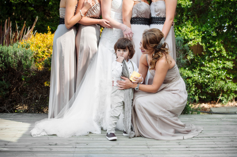 bridesmaids with cute page boy