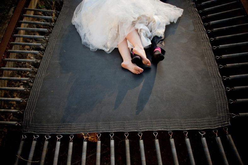 Bride and Groom on trampoline