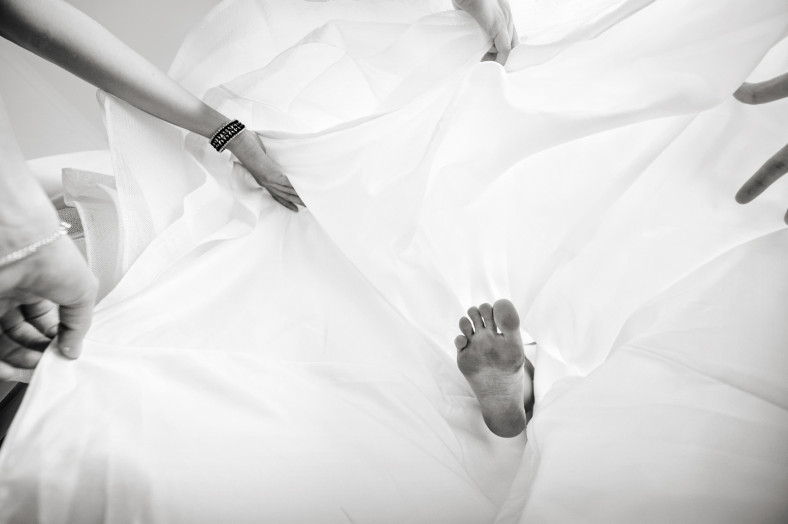 brides foot in dress