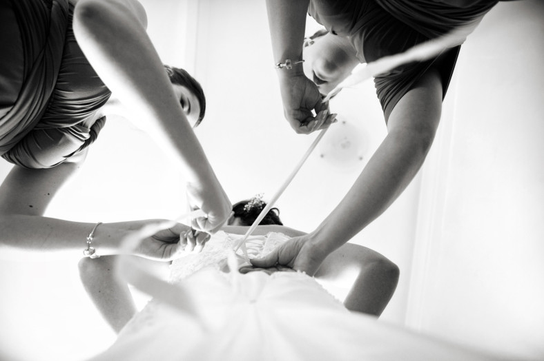 bride getting dressed