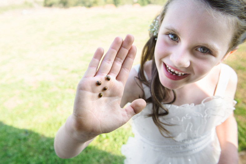 girl with lady bugs