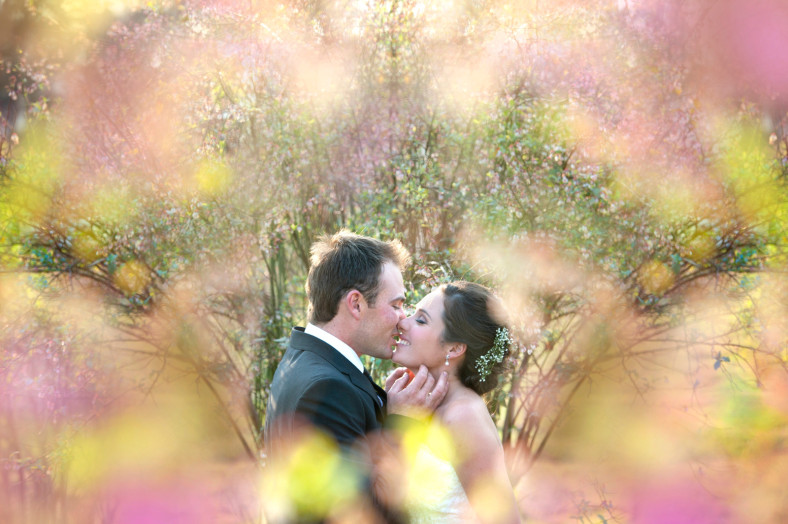 bride and groom kissing