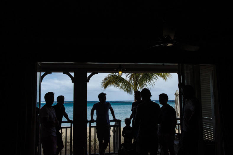silhouette of groom and groomsmen