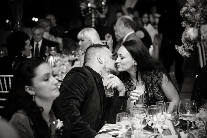 kiss in a crowded room