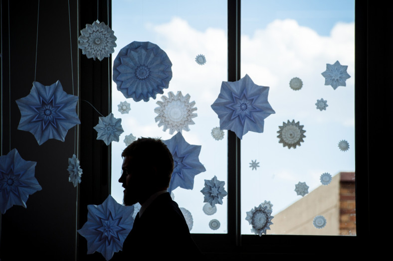 groom with snowflakes