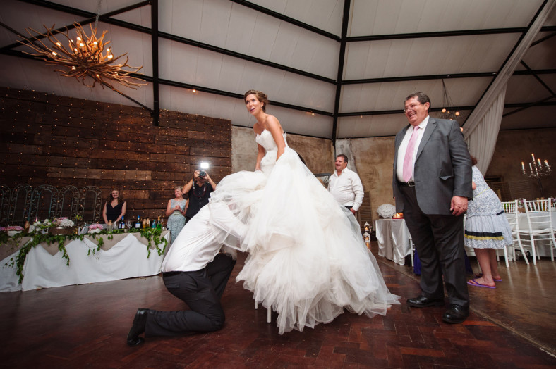 groom searching for garter
