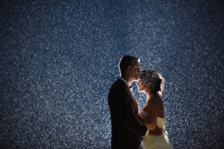 Wedding couple in the rain