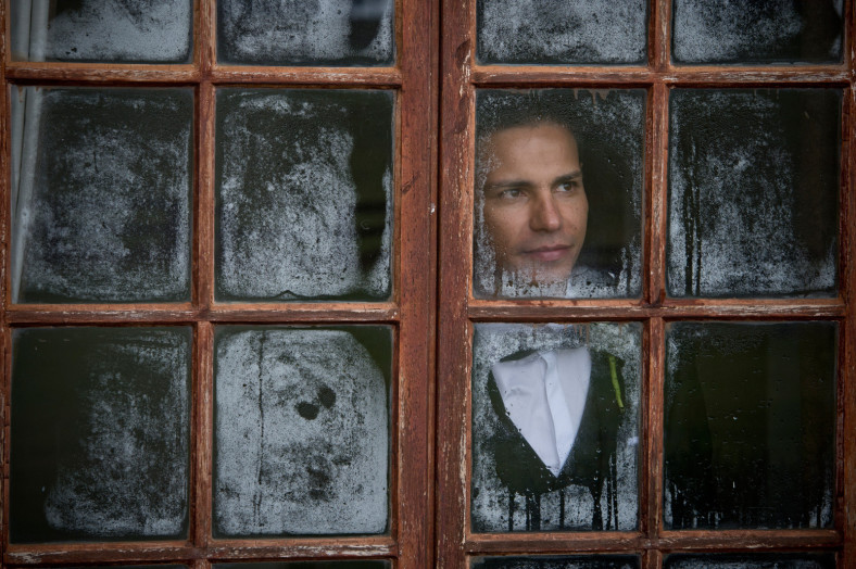 Groom in the rain