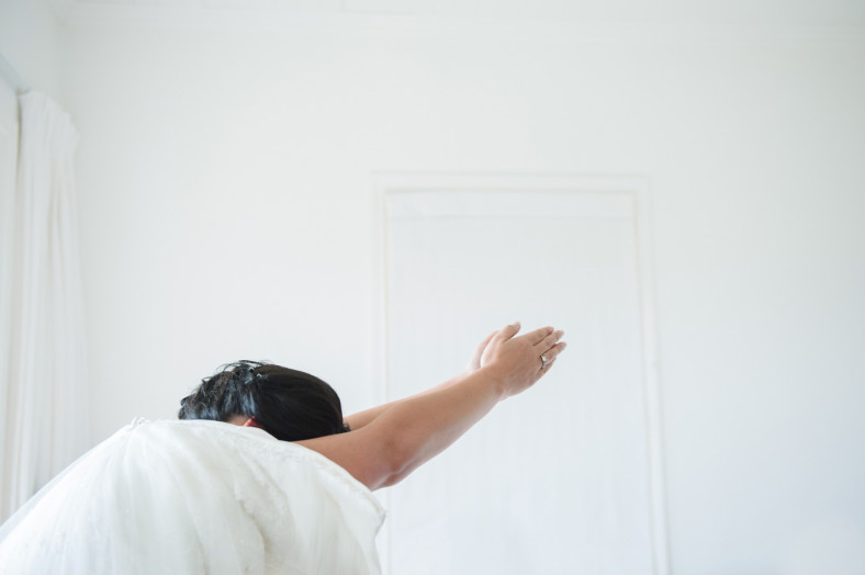 bride diving into dress