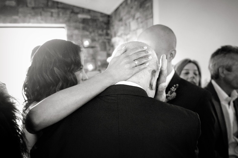 hand on bald head