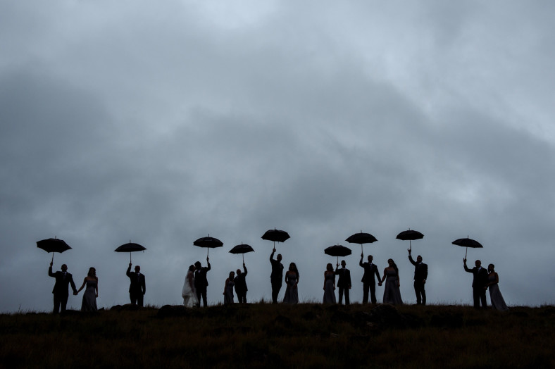 cloudy silhouette with umbrellas