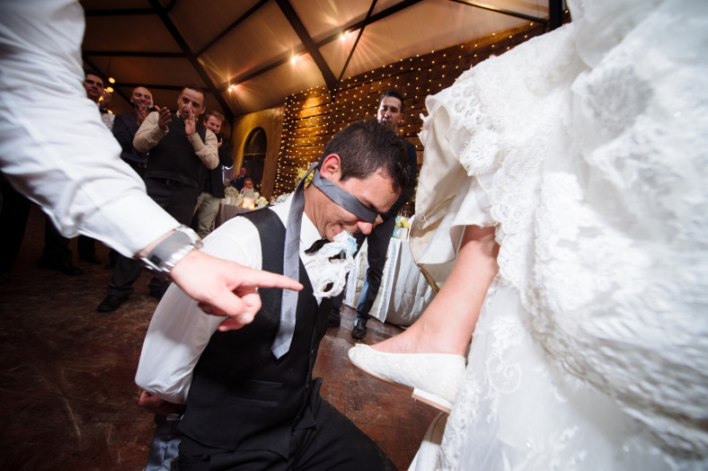 blindfolded looking for garter