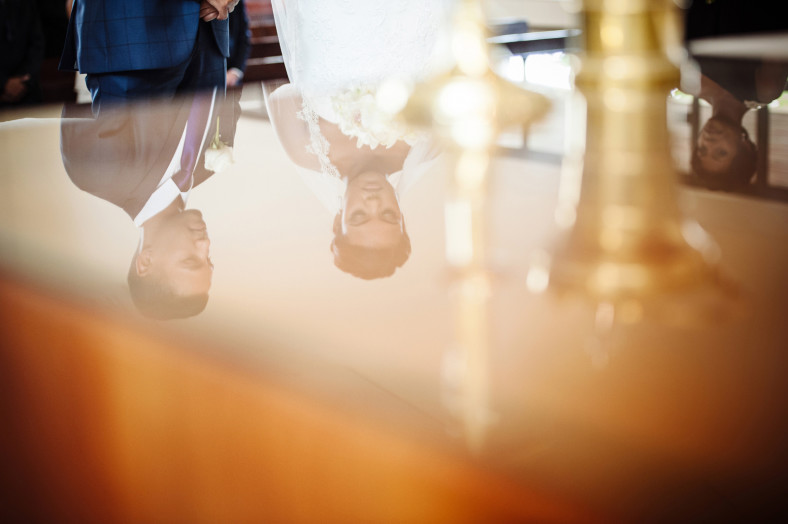 bride and groom reflection