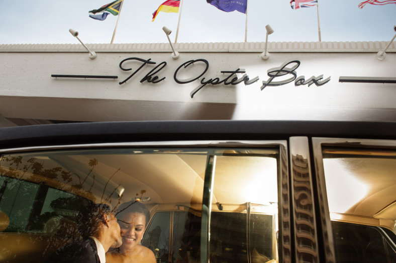 bride and groom in car