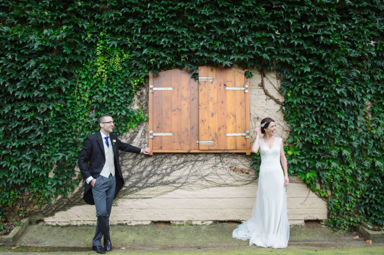 bride and groom in stable