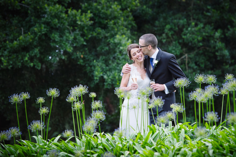 bride and grrom in grass