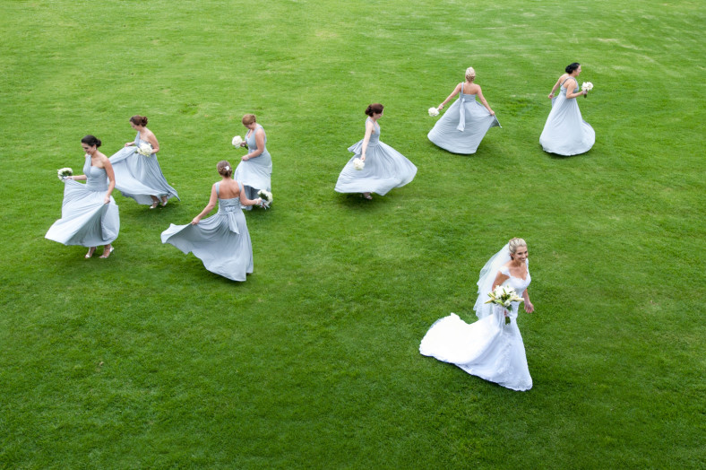 bride and twirling bridesmaids