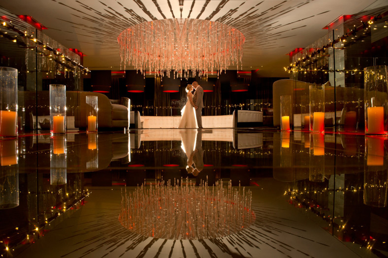 bride and groom reflection