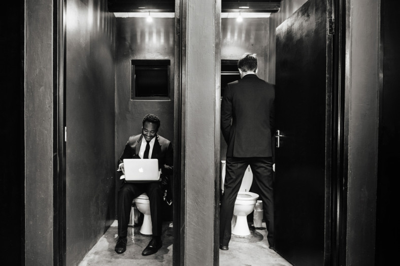 groom writing vows in the toilet
