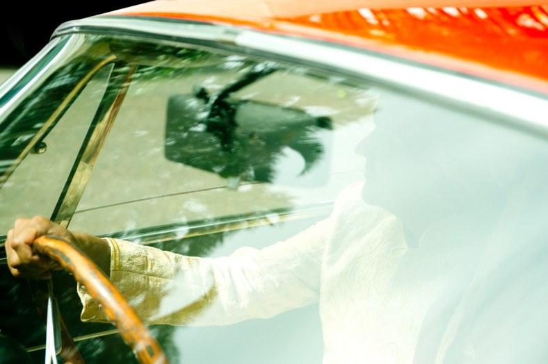 Hindu Christian Wedding Documentary Wedding Photographer Groom in car