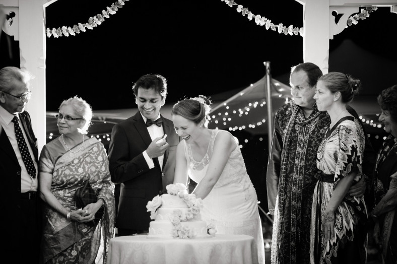 Hindu Christian Wedding Documentary Wedding Photographer Reception Cake cutting