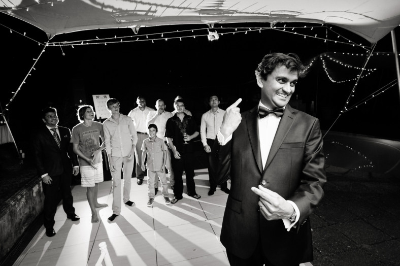 Hindu Christian Wedding Documentary Wedding Photographer Reception Garter Toss