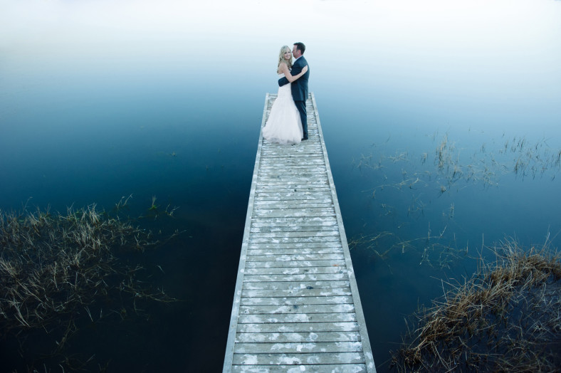 Midlands wedding bride and groom on a jetty