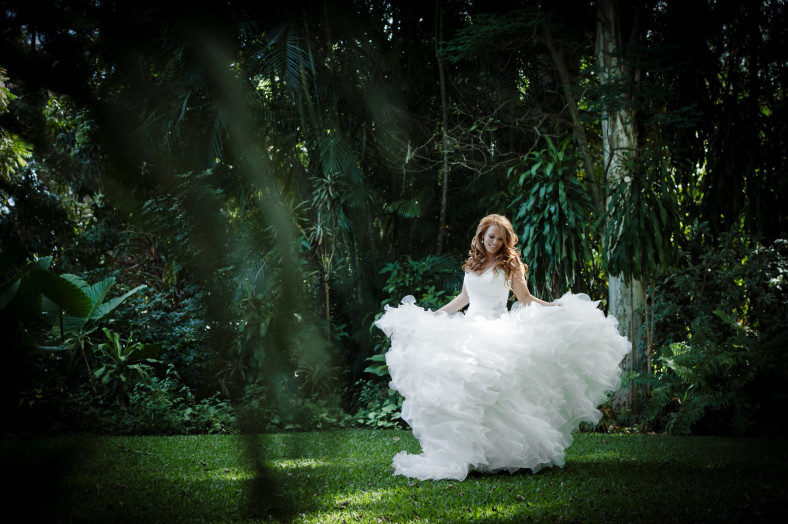 Bride twirling in garden