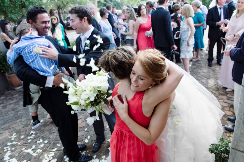 Bride and Groom congratulations with rose petal confetti