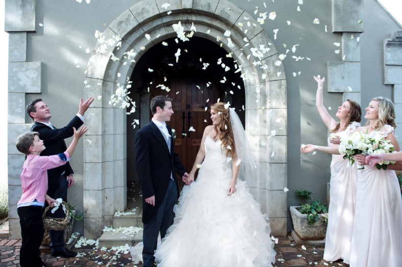 Bride and Groom congratulations with rose petal confetti