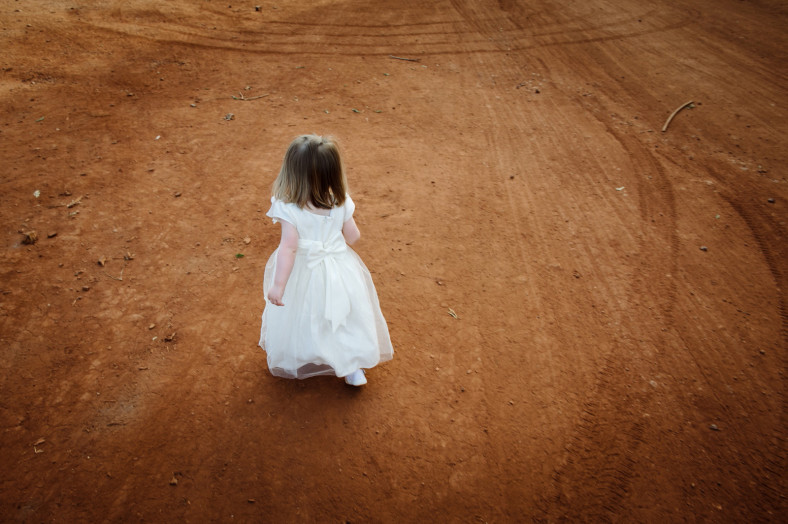 Cute girl on dirt road