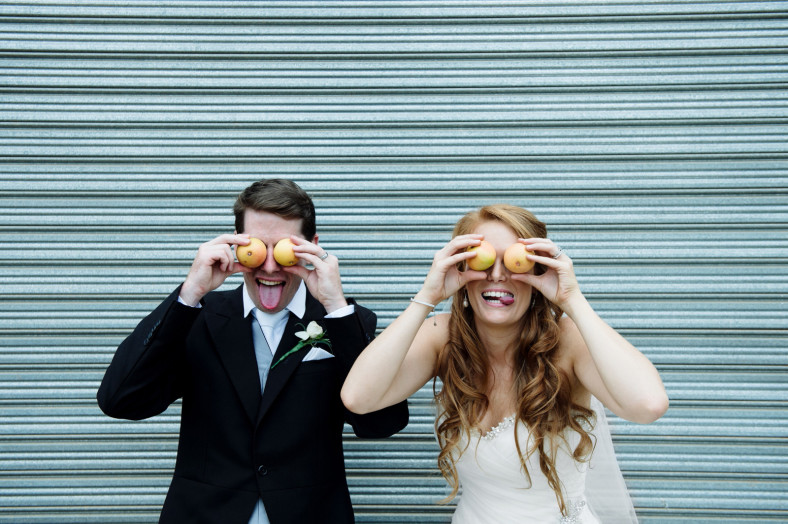 Quirky wedding pic with grapefruit