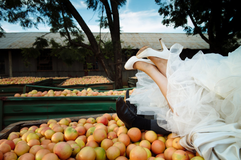 Bride and Groom feet on fruit