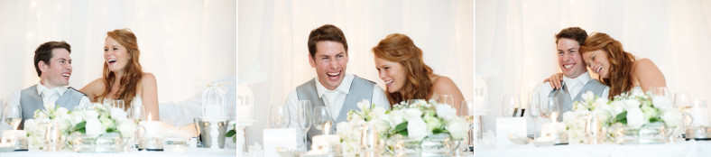 Bride and Groom laughing at speeches