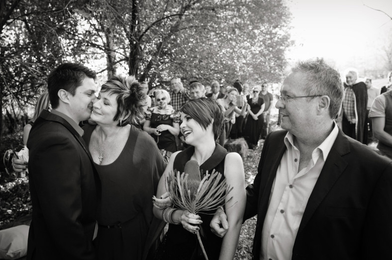 bride in black dress with groom