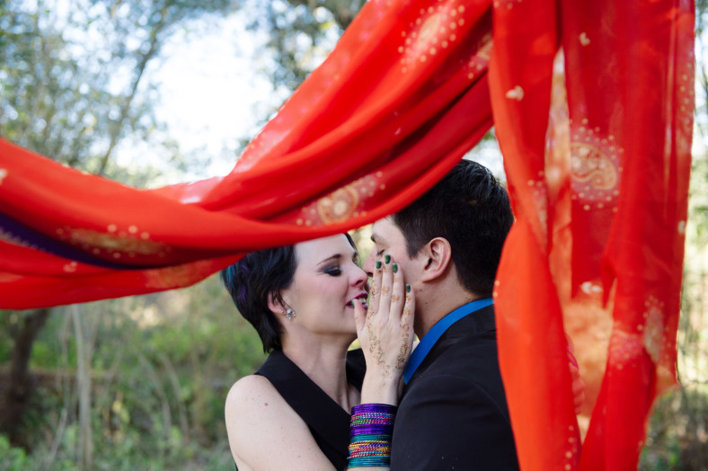 groom and bride in black dress