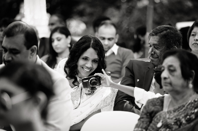guest with camera at wedding