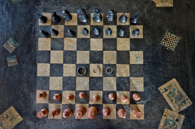 Wedding rings on a chess board