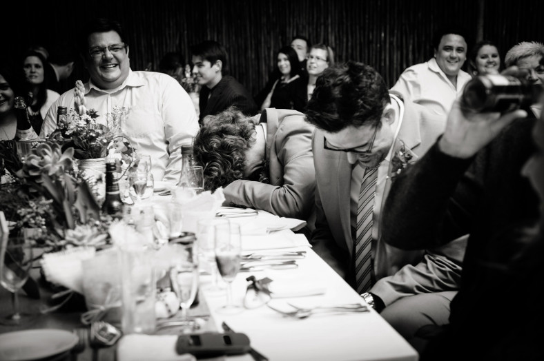 guests laughing at wedding