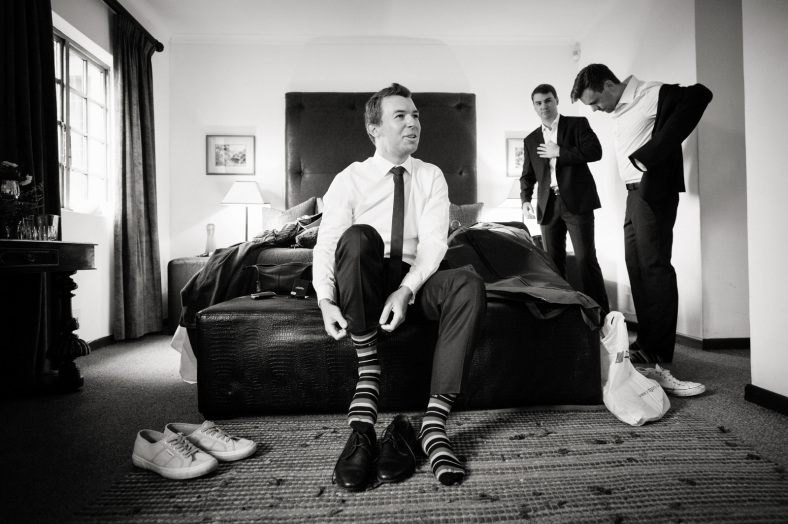 Groom with striped socks