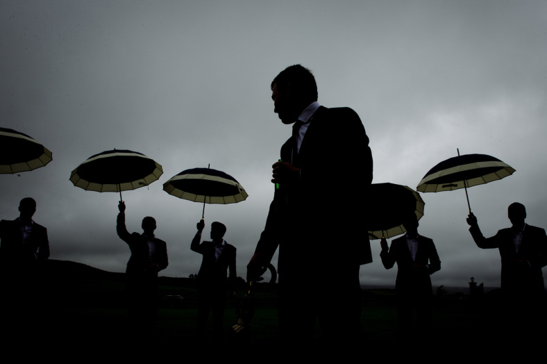 Groom in the rain