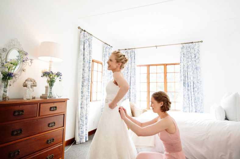 Bride getting dressed