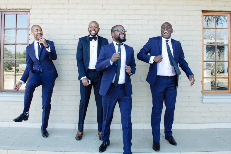 Men in suits dancing