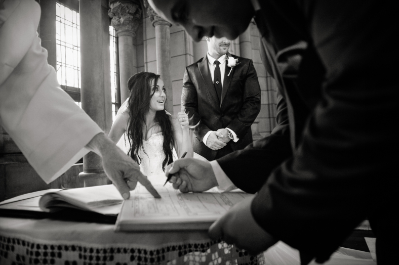 Bride and Groom signing register